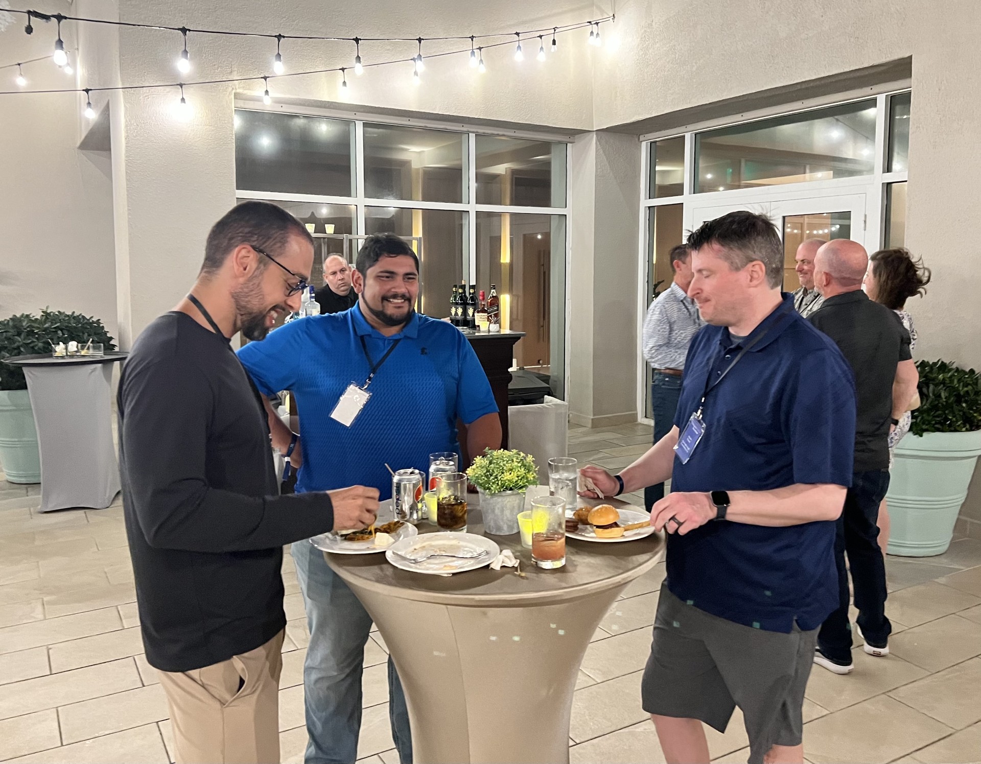 Three men at table